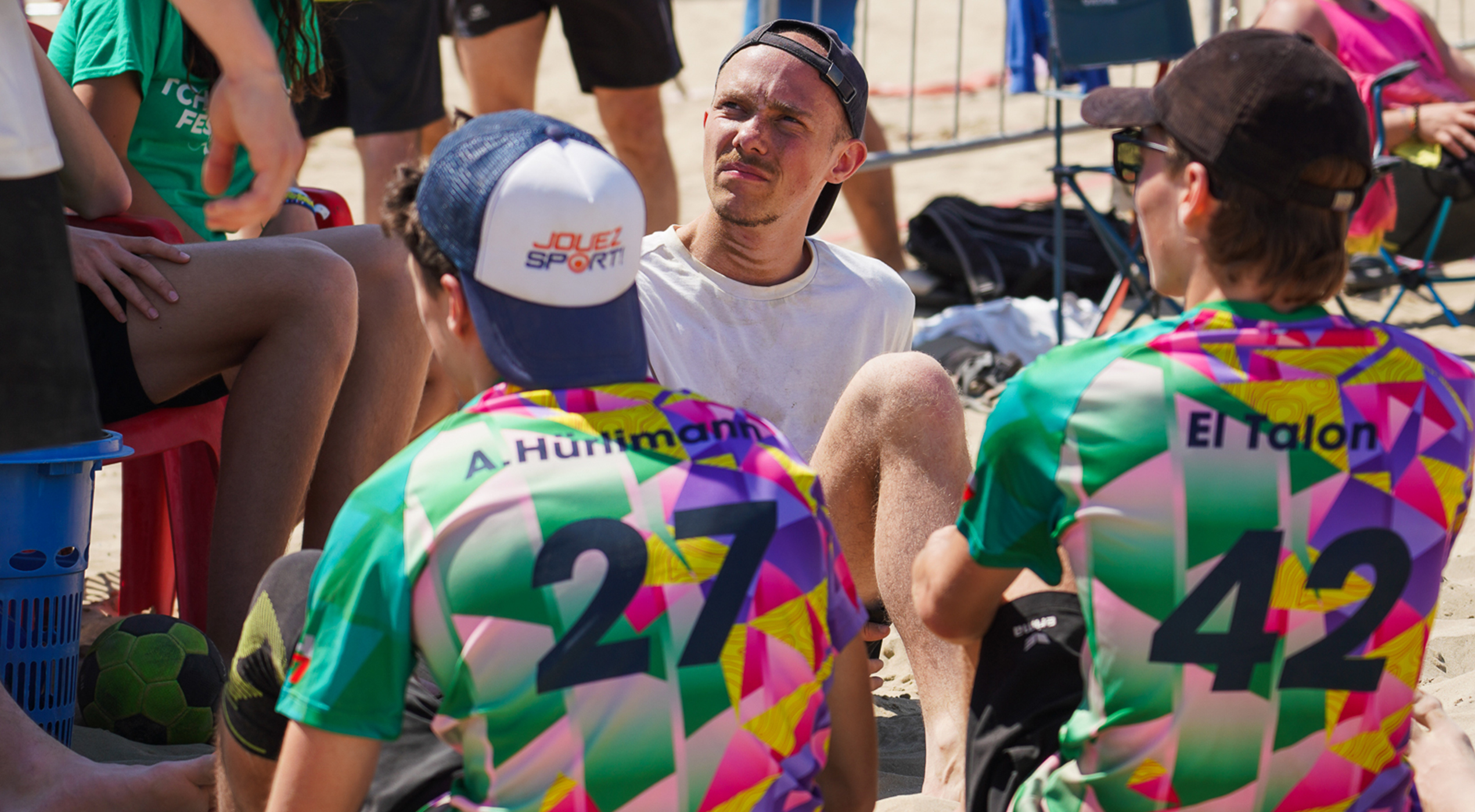 Players relaxing on the beach